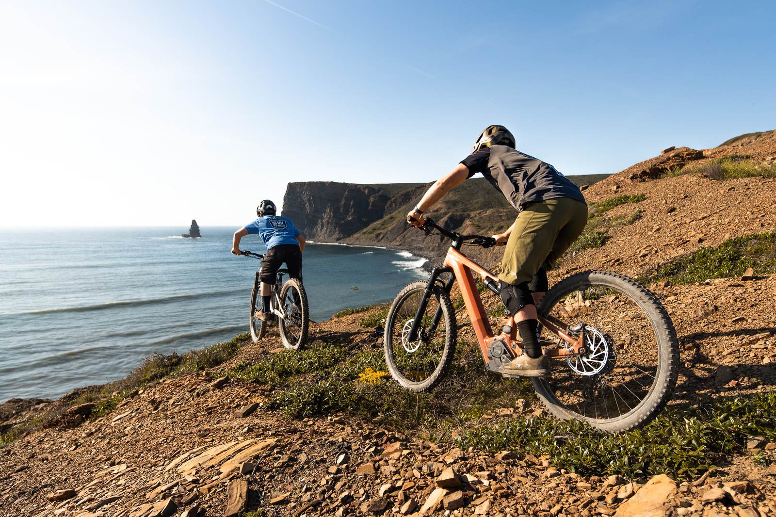 Mountain bike riders on the Coastal Explorer tour with ocean views in the Algarve